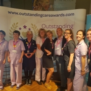 This image shows care staff at an awards event.
